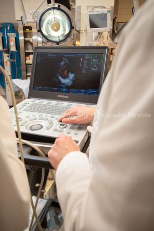 Dr Henwood in ED with Point of Care Ultrasound Device-6856